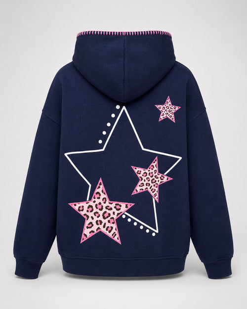 Navy blue hoodie with pink star designs on a white background