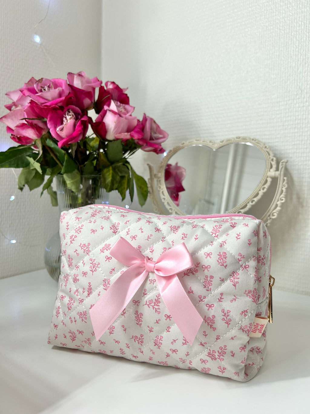 PrettyLittlePink floral bow makeup bag by Josy Marie